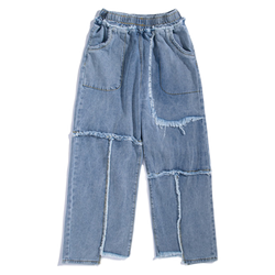 Distressed washed jeans with raw edges